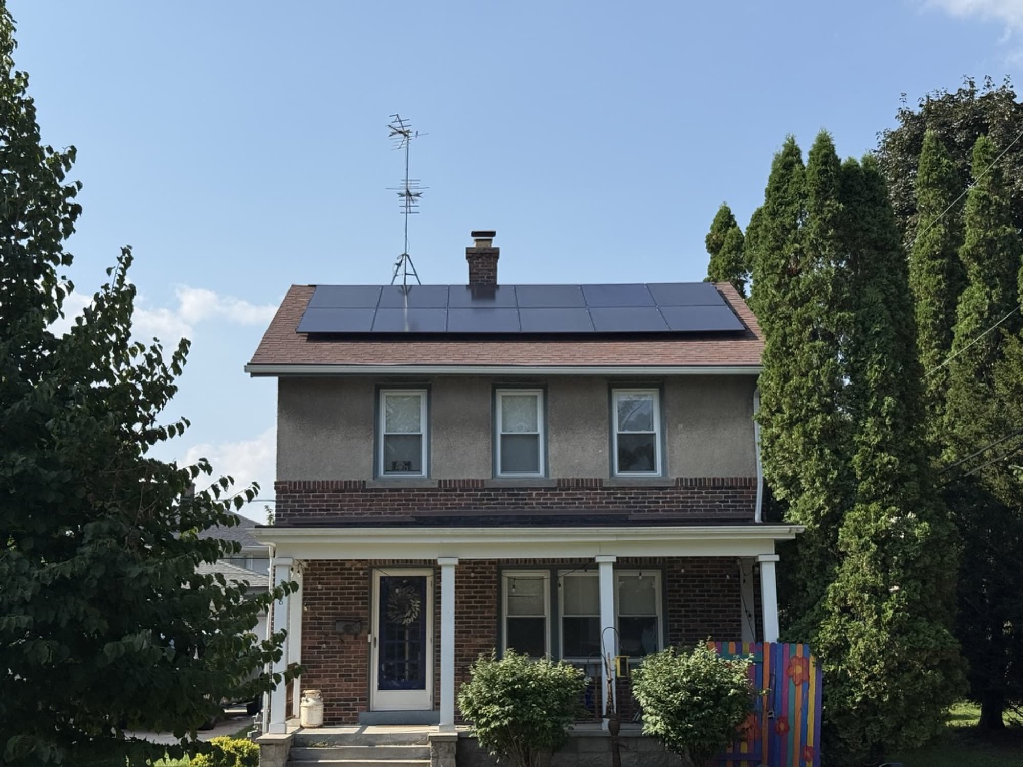 All-black solar array on a classic two-story home in Kohler, Wisconsin