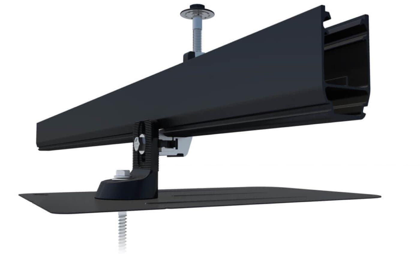 IronRidge all-black anodized mounting rail seated on an under-shingle flashing