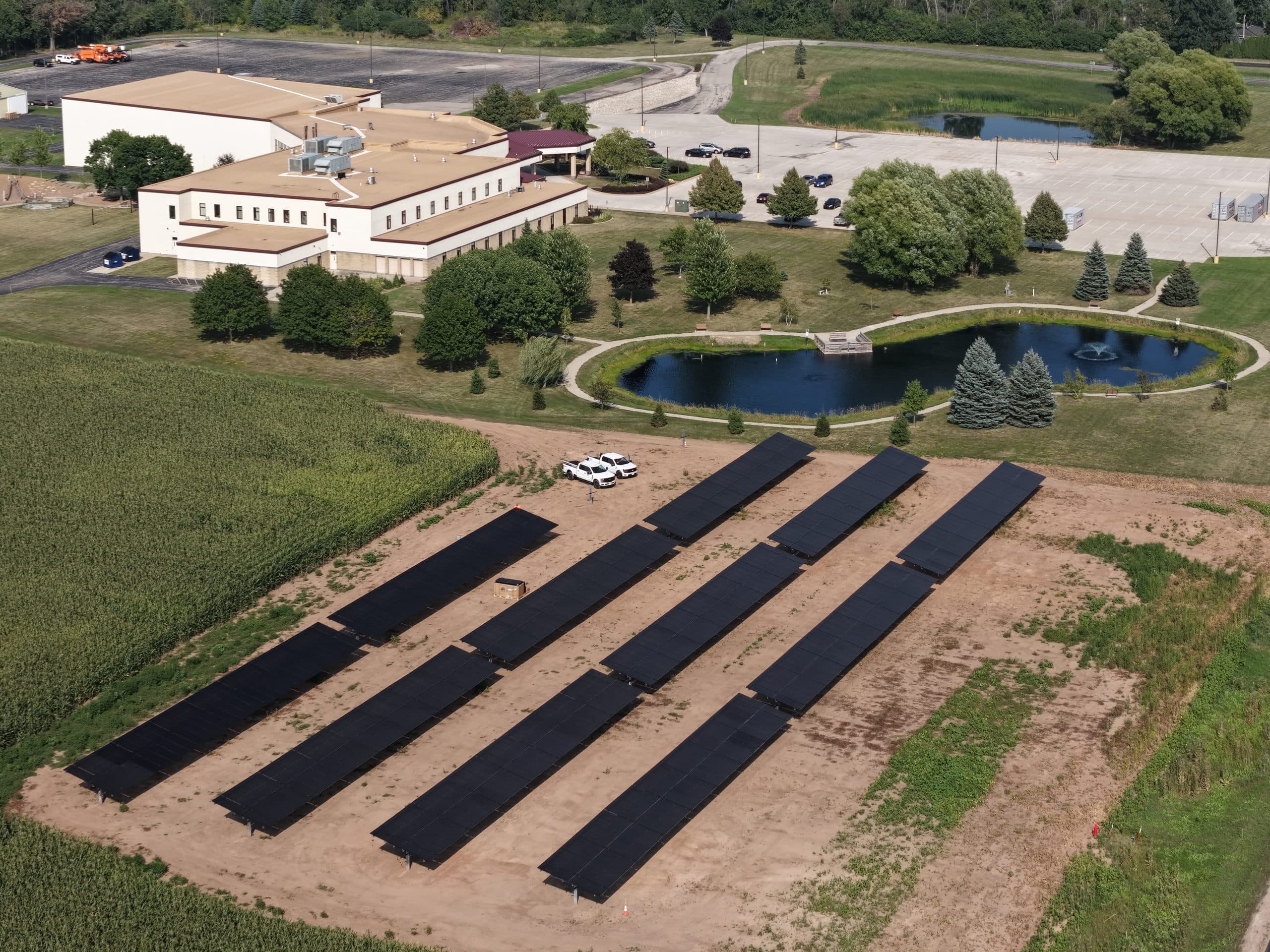 Aerial view of the 702-panel ground-mounted solar array beside Christ the Rock Community Church in Menasha, Wisconsin